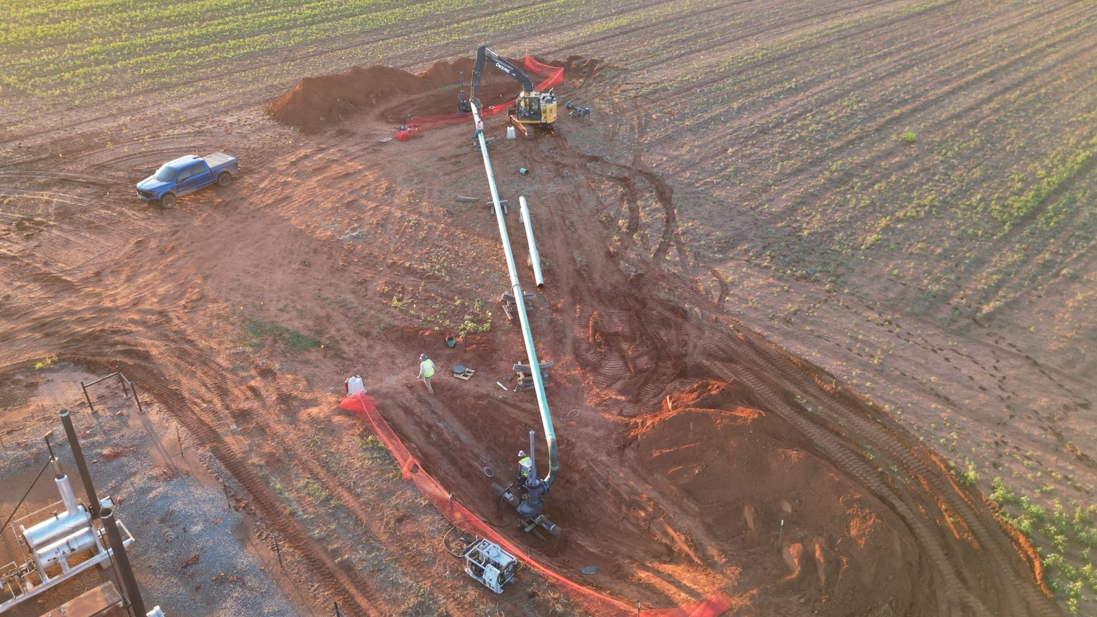 Aerial view of a stopple bypass operation isolating a defective pipe section
